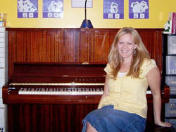 Natalie at her new piano