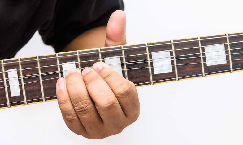 guitarists bend strings to adjust pitch