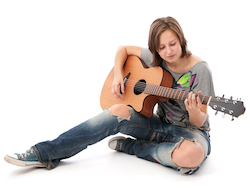 Guitarist playing by ear