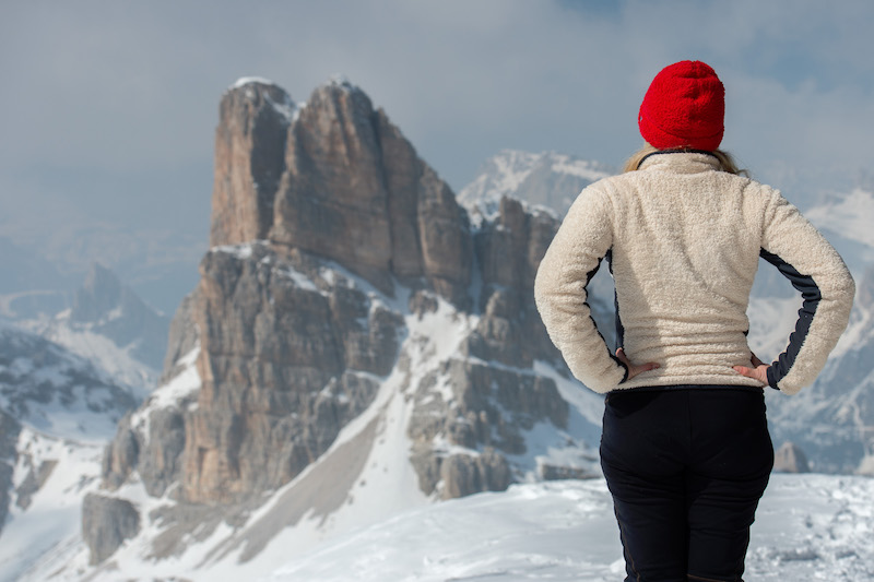 woman contemplating dolomites panorama landscape