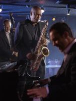 sax-player-with-rhythm-section-bass-and-piano