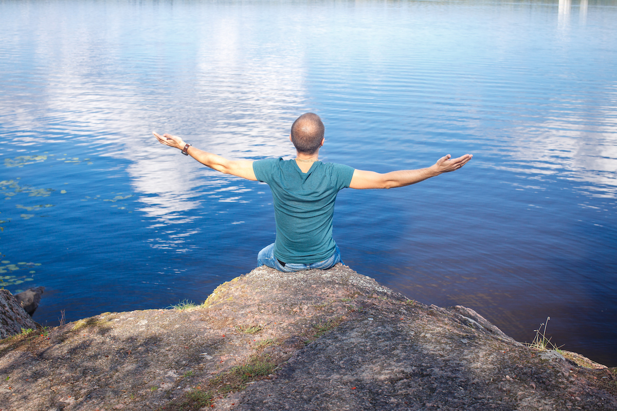 Everything is going to be much easier, man looking over lake