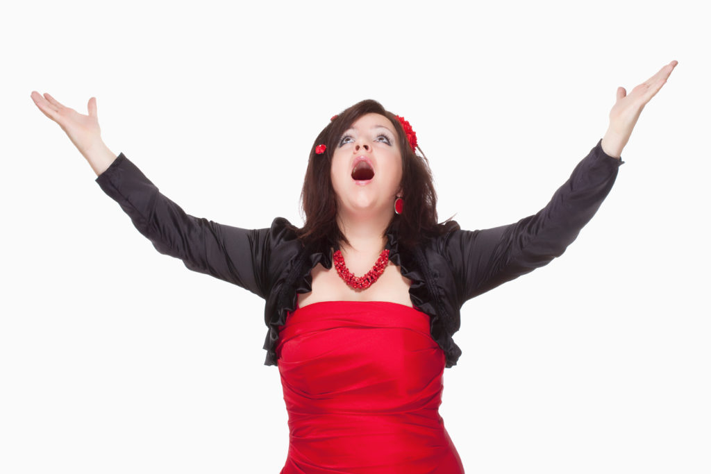 Soprano singer performing on a stage