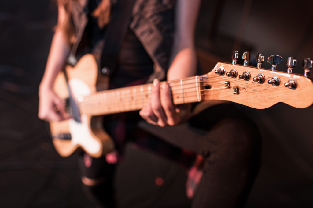 Rhythm guitarist playing