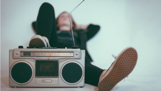 Woman listening to music on the radio