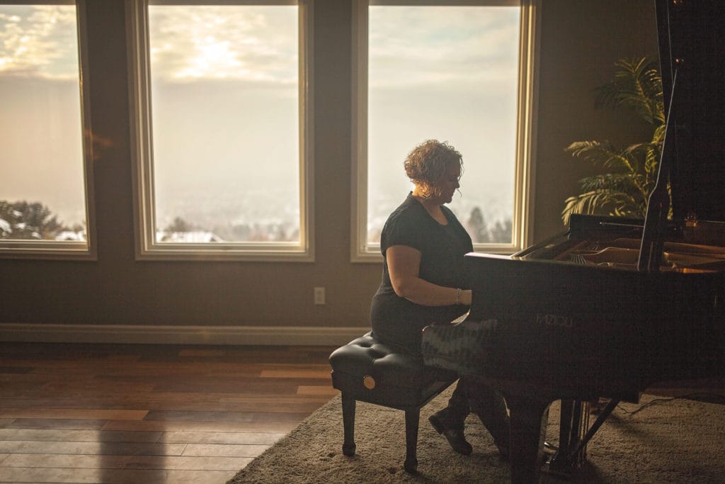 Michele McLaughlin playing the piano