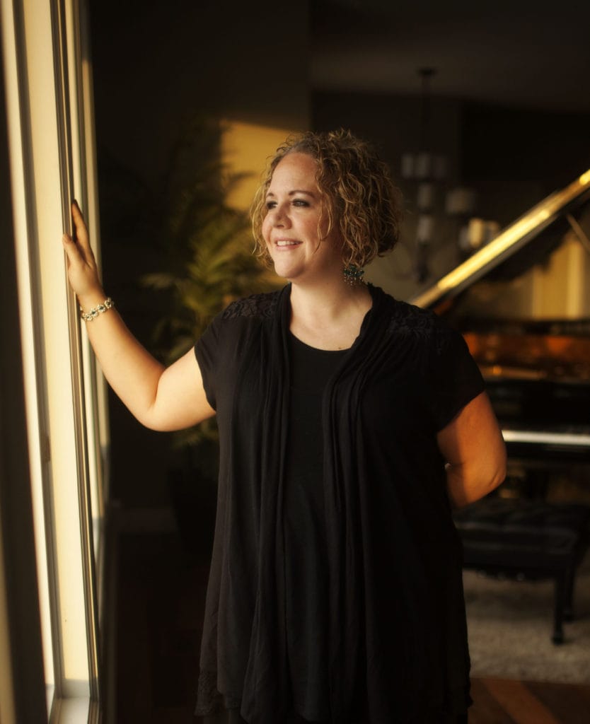 Michele McLaughlin in her piano studio